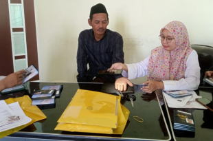 Proses perekaman bio visa jamaah oleh kemenangan Pamekasan ( Dok)