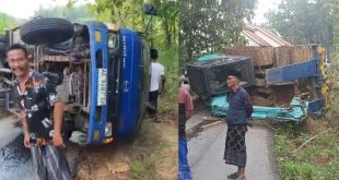 Gagal Nanjak, Truk Muat Excavator Terguling dan Tutup Akses Jalan di Pegantenan